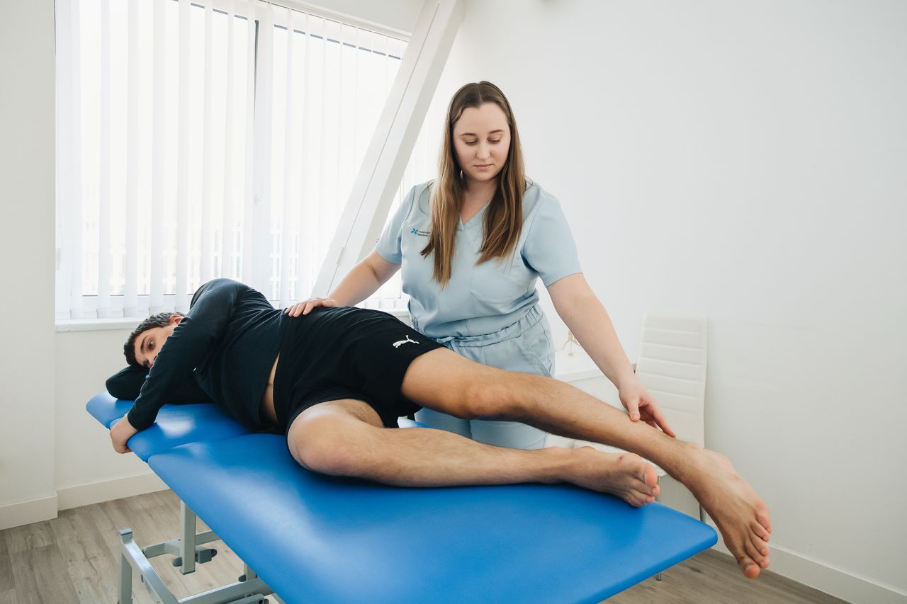 Industries We Serve Physiotherapist treating a patient